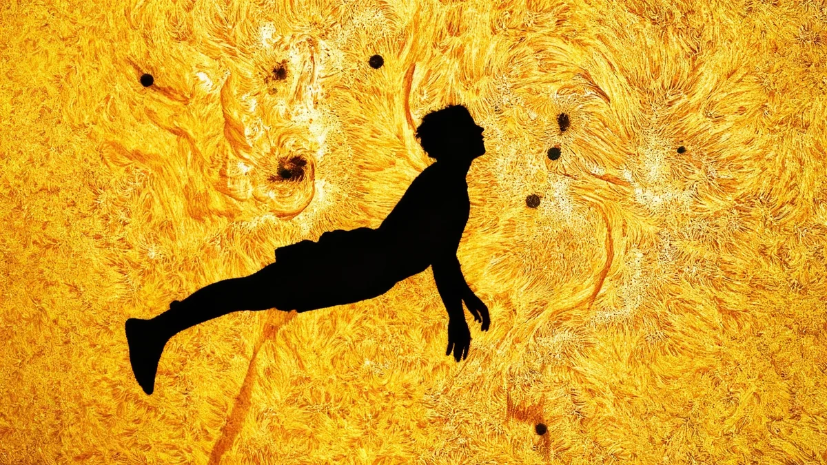 Astrophotographer Captures Skydiver Against Sun